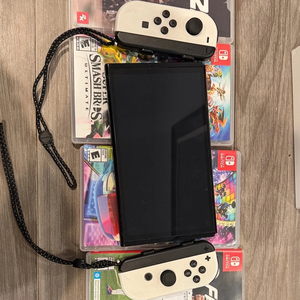 Nintendo Switch Console with White Dock and Red/Blue Controllers